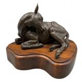 Bronze Sculpture of Reclining Cow by Kathie F