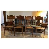 Four Antique Oak Pressed Back Cane Seat Chairs