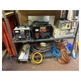 Metal Shelf with Contents and Coleman Lantern