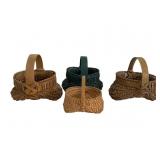 Four Vintage Hand-Woven Mini Butt Baskets