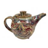 Pottery teapot with multicolored drip marbled