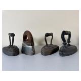 Four Cast Iron Sad Irons