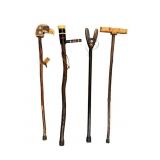 Hand Carved Walking Sticks Group of 4