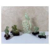 Five Carved Jade Figures with Stands