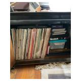 Contents of End Table with Vinyl Records & VHS