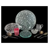 An Assortment of Glassware and Silverplate Utensil
