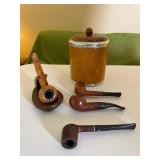 An Assortment of Briar Pipes and Accessories