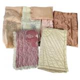 An Assortment of Luxury Vintage Doll Comforters