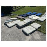 Assorted patio chair pads, floral & solid motifs
