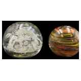 Two Jim Davis Art Glass Paperweights