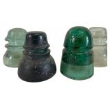 Group of 4 Antique Glass Line Insulators