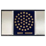 A Collection Of Miniature US Presidential Bronze M
