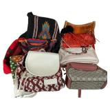 An Assortment of Woven and Synthetic Handbags