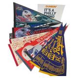 Assortment of Nine Sports Pennants and One Sign
