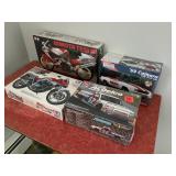Four Tamiya, Monogram, and AMT Model Kits