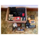 Assortment of Vintage Cameras and Accessories