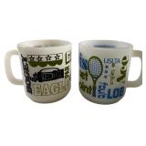 A Pair of Vintage Sports Milk Glass Mugs