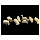 Group of 8 Hand Carved Natural Material Figurines