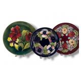 Three Moorcroft Pottery Tubelined Floral Plates