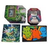 Collection of Modern Pokemon TCG Cards and Tins