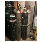 Assortment of Gas Cylinders and Hand Truck