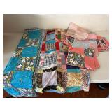 An Assortment of Vintage Quilt Tops and Pieces