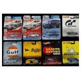 A Group of Auto World and Hot Wheels Die-Cast Cars