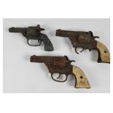 Gene Autry+ Cast Iron Toy Cap Pistol Guns (3)