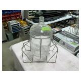 VINTAGE 5GAL GLASS JUGS ON POURING STAND-CARBOY