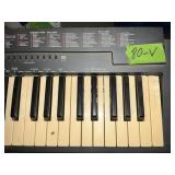 YAMAHA KEYBOARD ON STAND UNTESTED- NO CORD
