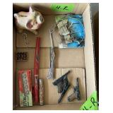 METAL PIGGY BANK, TOY GUNS, WIND CHIME, KNIVES