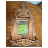 ANTIQUE WOODEN WALL-MOUNTED MIRROR