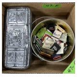 PAPER MATCHBOOK IN METAL BUCKET & TIN