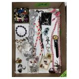 FLAT OF COSTUME JEWELRY: NECKLACES, PINS, EARRINGS
