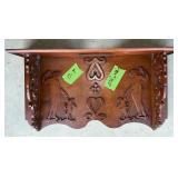 WALL-MOUNTED WOODEN SHELF WITH WOMAN AND CHERUBS
