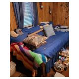 Daybed With Blue Bedding and Pillows