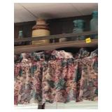 Shelf with Assorted Vintage Glass Jars and Crock
