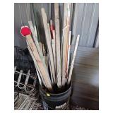 Wood and Metal Stakes in Bucket