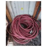 Coiled Red Industrial Hose