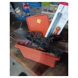 Orange Container with Chainsaw Chain and Acc