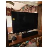 Samsung Flat Screen TV with Remote and Soundbar
