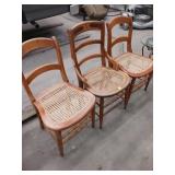 Three Wooden Chairs with Cane Seats