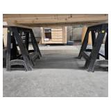 Two Black Plastic Sawhorses