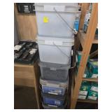 Stack of Plastic Storage Totes with misc hardware