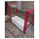 Glass Showcase With Red Accents