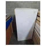 Stack of Wood Panels With White Finish