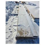 Lumber Boards Lot in Snow-covered Condition