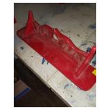 Red Plastic Shelf with Heart Cutout