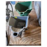 Two Handheld Seed Spreaders