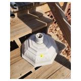 Base for an umbrella